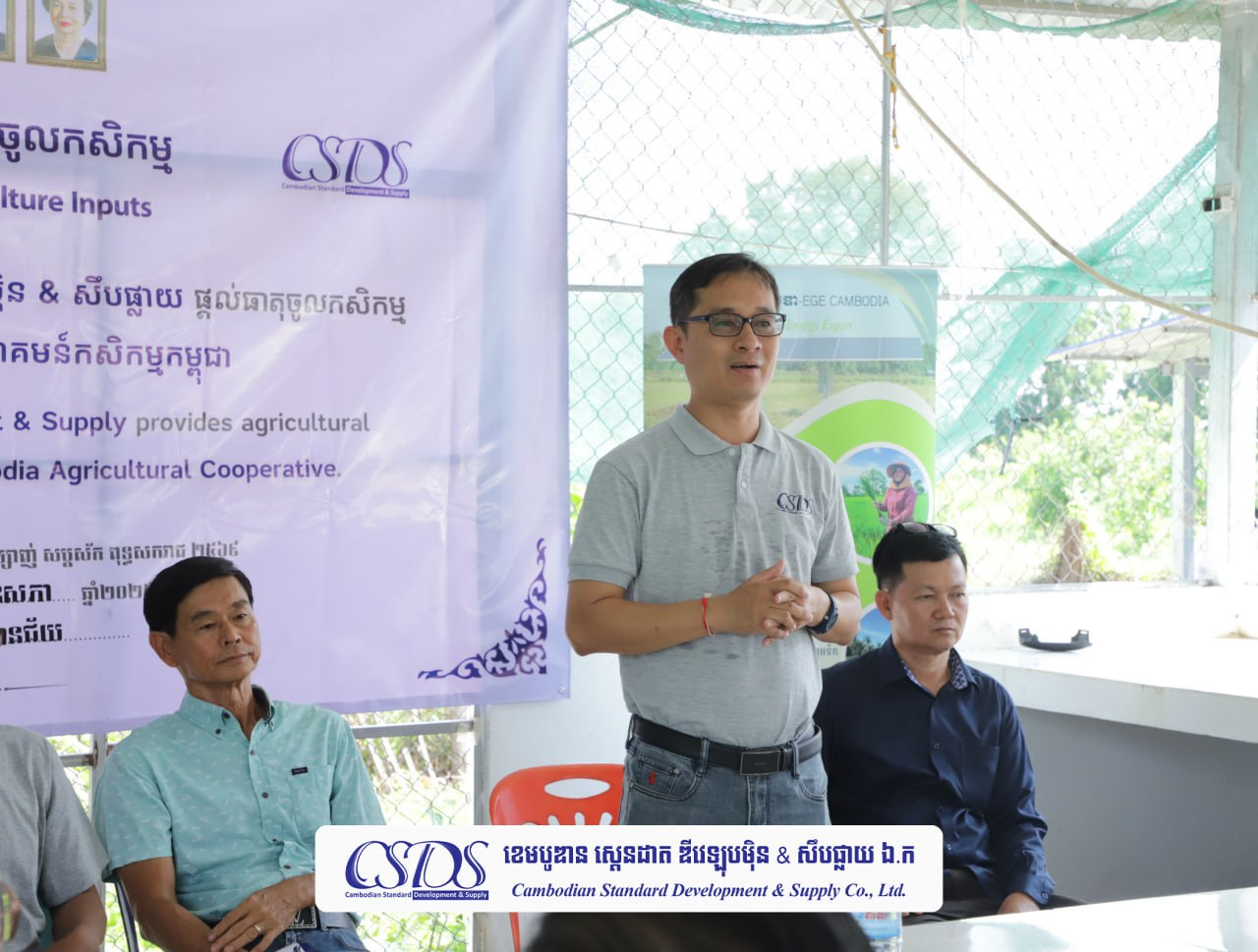 CSDS leadership addressing farmers at a cooperative event